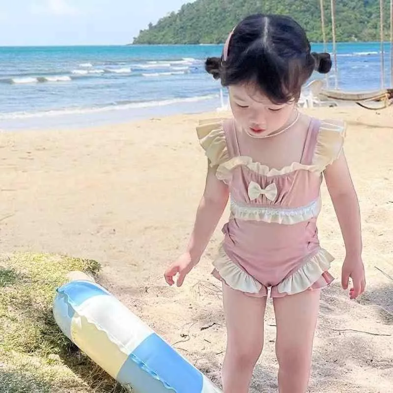 水着 キッズ 女の子 ワンピース 子供用 スイムウェア かわいい 蝶結び フリル 無地 韓国 スイミング プール 海水浴 ビーチウェア 接触冷感 速乾 伸縮性 ストレッチ ナイロン製 快適 軽量 着脱簡単 幼稚園 保育園 小学生 発表会 レジャー 旅行