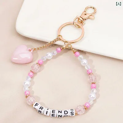 バッグチャーム レディース キーホルダー かわいい ハンドメイド ボヘミアン風 ビーズ アルファベット タッセル チェーン バッグアクセサリー