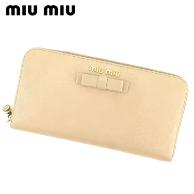 【お買い物マラソン★30%OFFクーポン】ミュウミュウ 長財布 ラウンドファスナー リボンモチーフ ベージュ レザー miu miu 【ミュウミュウ】 t13633s 【中古】 ブランド ハイブランド ヴィンテージ 送料無料