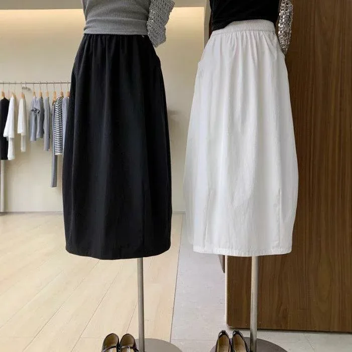 スカート レディース 春夏 ミモレ丈 フレアスカート Aライン 体型カバー ゆったり 大きいサイズ 細見え 花苞スカート 繭型 膝下丈 ウエストゴム ストレッチ性 ブラック ホワイト バイカラー 高級感 モノトーン 着痩せ 伸縮性 普段使い 通勤用 カジ