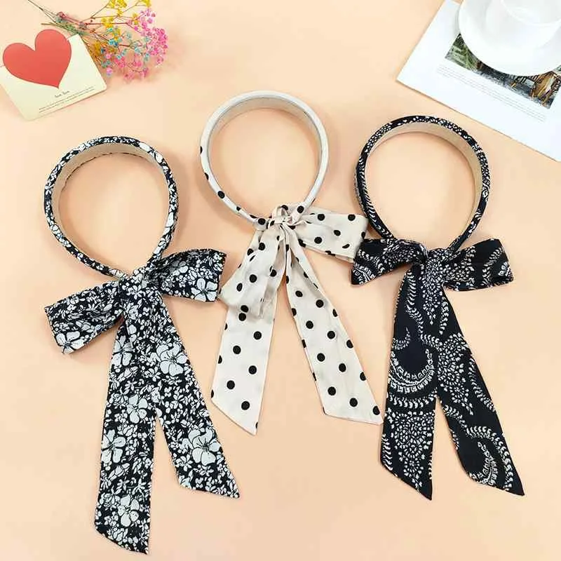 レディース ヘアアクセサリー 布製 リボン 蝶結び ヘッドバンド シンプル レトロ ドット柄 フラワープリント ヘアクリップ 編み込み スタイル かわいい デザイン 普段使い ヘアアレンジ