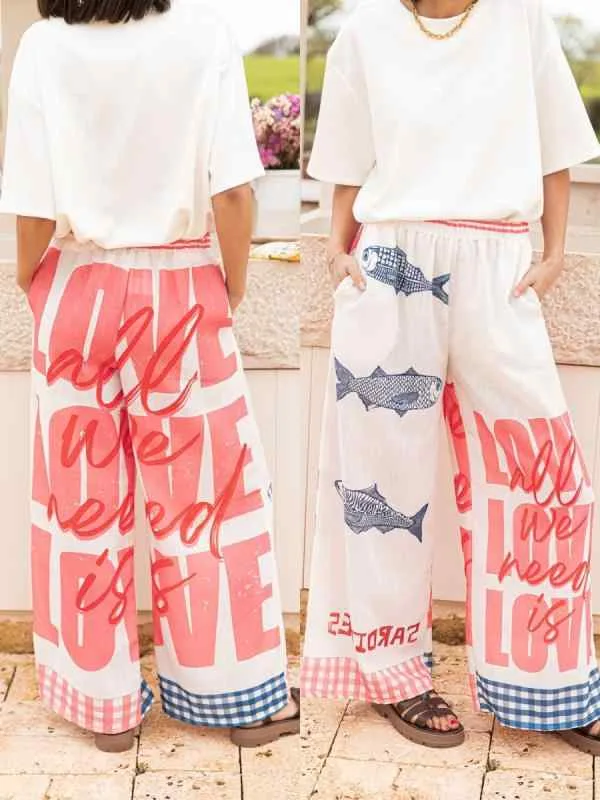 レディース 夏 パンツ ワイドレッグ ストレート ゆったり カジュアル リゾート グラフィティ プリント ビーチ 普段使い フィット コットン混 軽量
