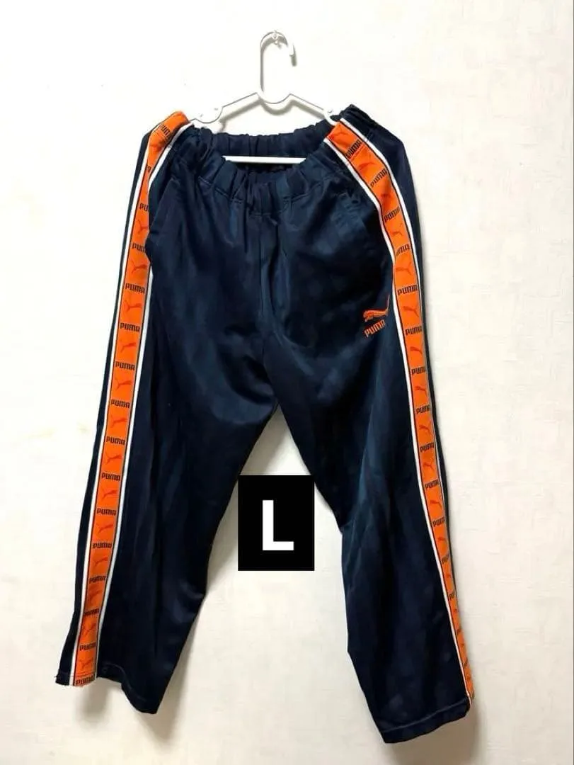 【PUMA / プーマ】サイドテープ ロゴ ジャージ トラックパンツ紺×オレンジ