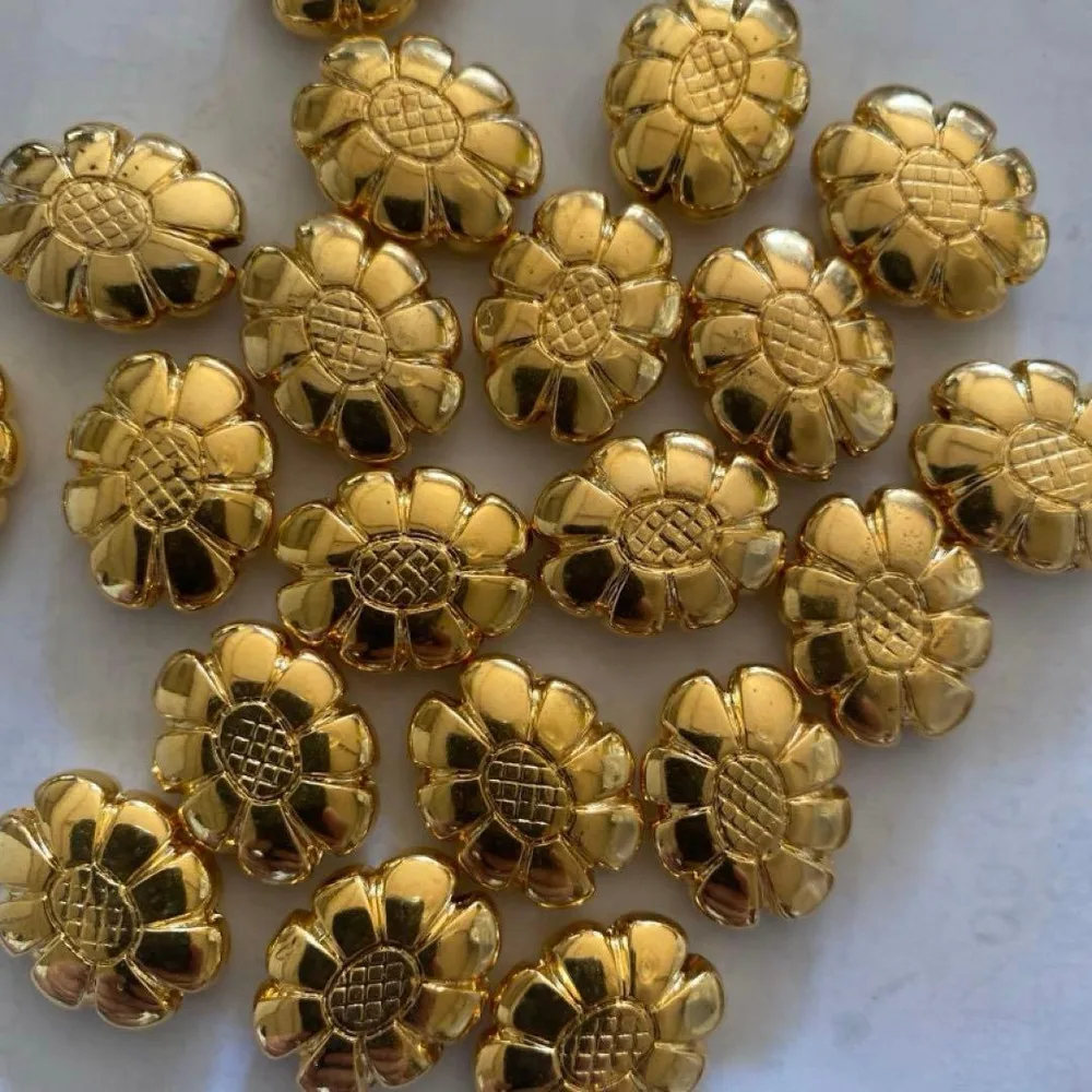 金色の花形メタルパーツ 20個