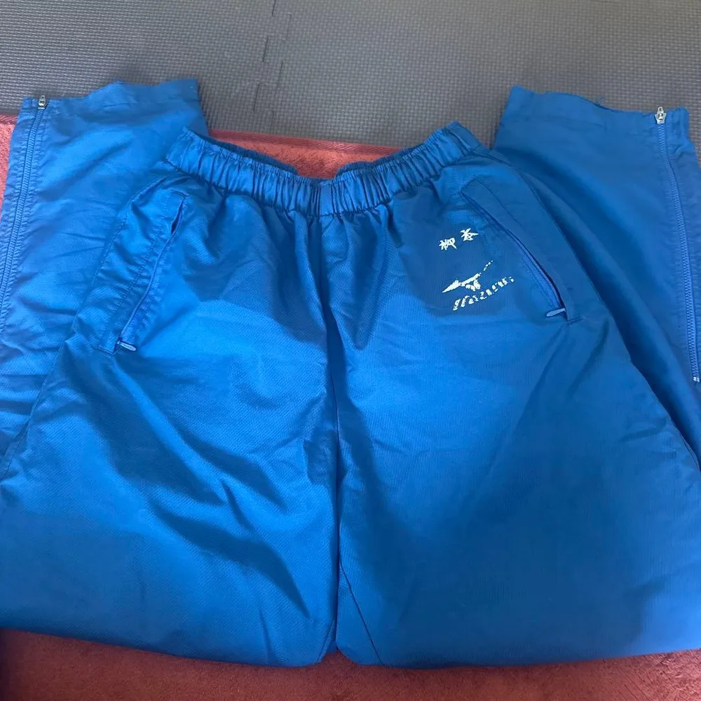 เสื้อกันลม MIZUNO