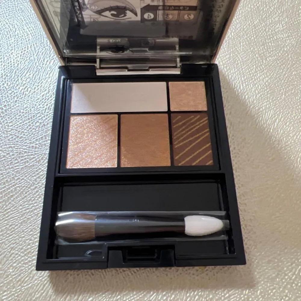 MAQuillAGE ドラマティックスタイリングアイズ OR303