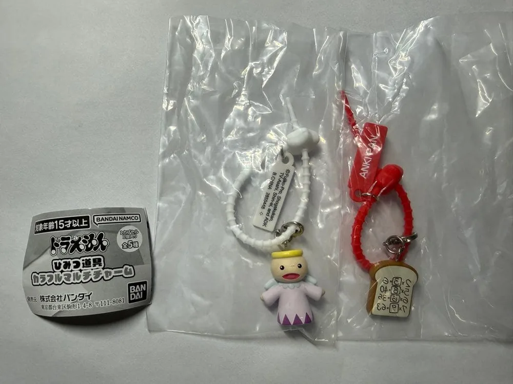 ドラえもんひみつ道具カラフルマルチチャ ーム ミチビキエンゼル・アンキパン