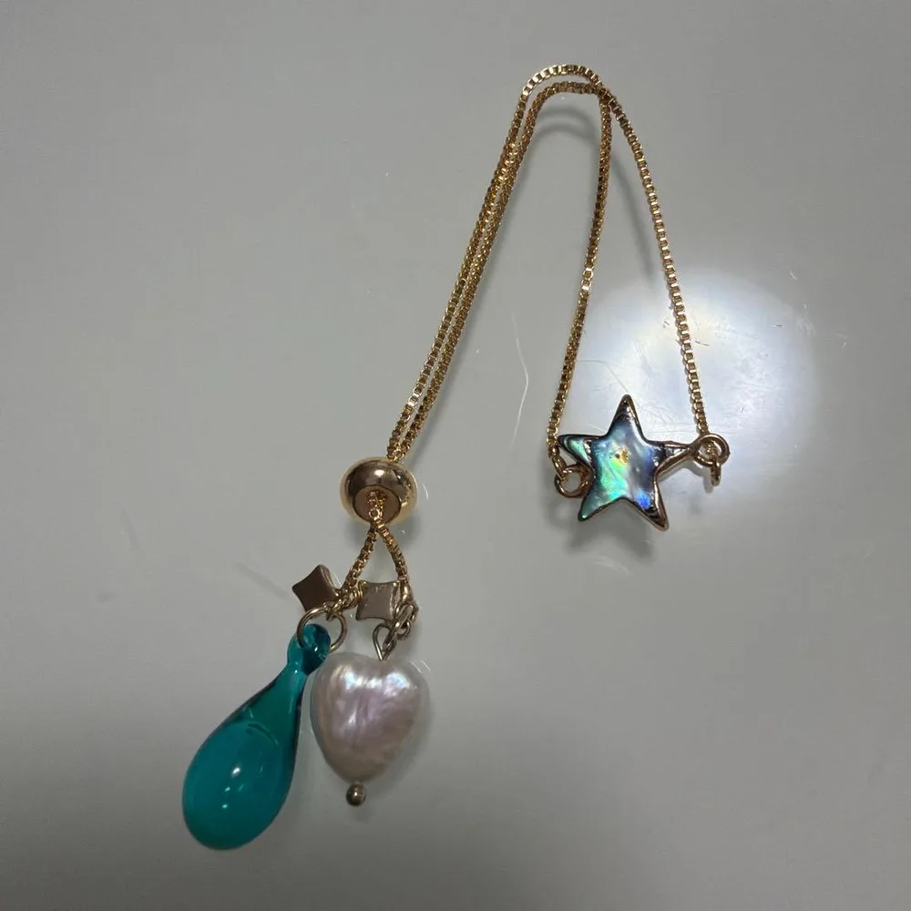 アロマオイルを入れられるハートの真珠ブレスレット ハンドメイド