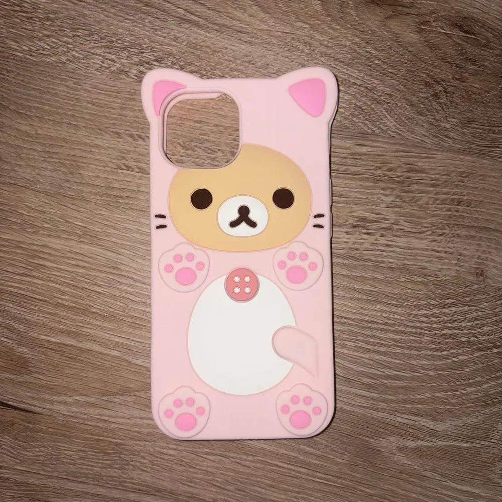 iPhone15コリラックマ ねこ ピンク スマホケース