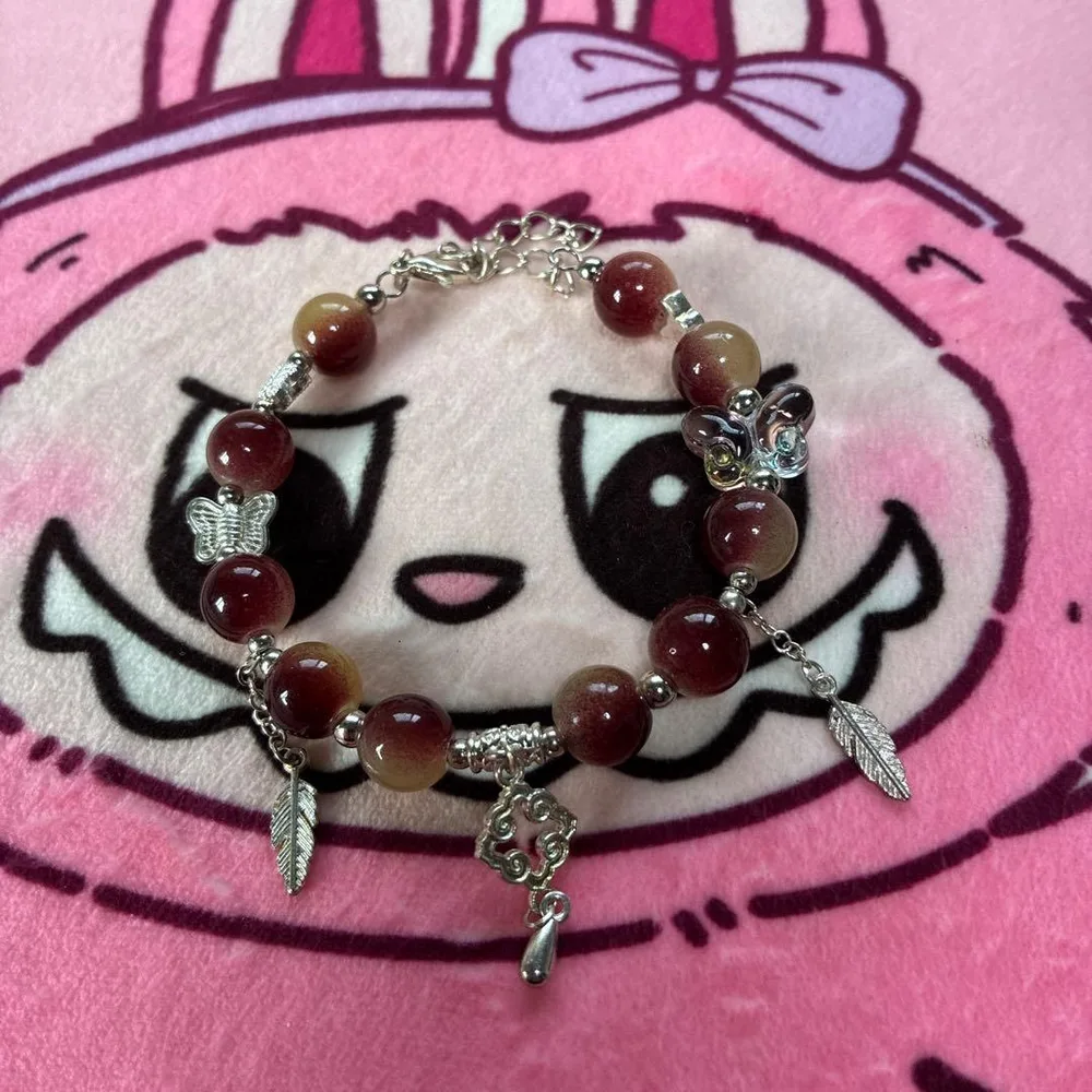 ハンドメイド ビーズブレスレット バタフライ&フェザーチャーム