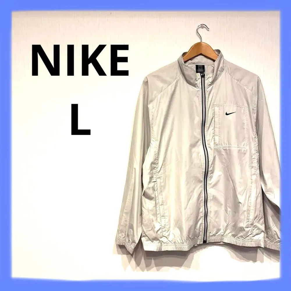 NIKE ゴルフ ナイロンジャケット ジップアップ アイボリー Lサイズ
