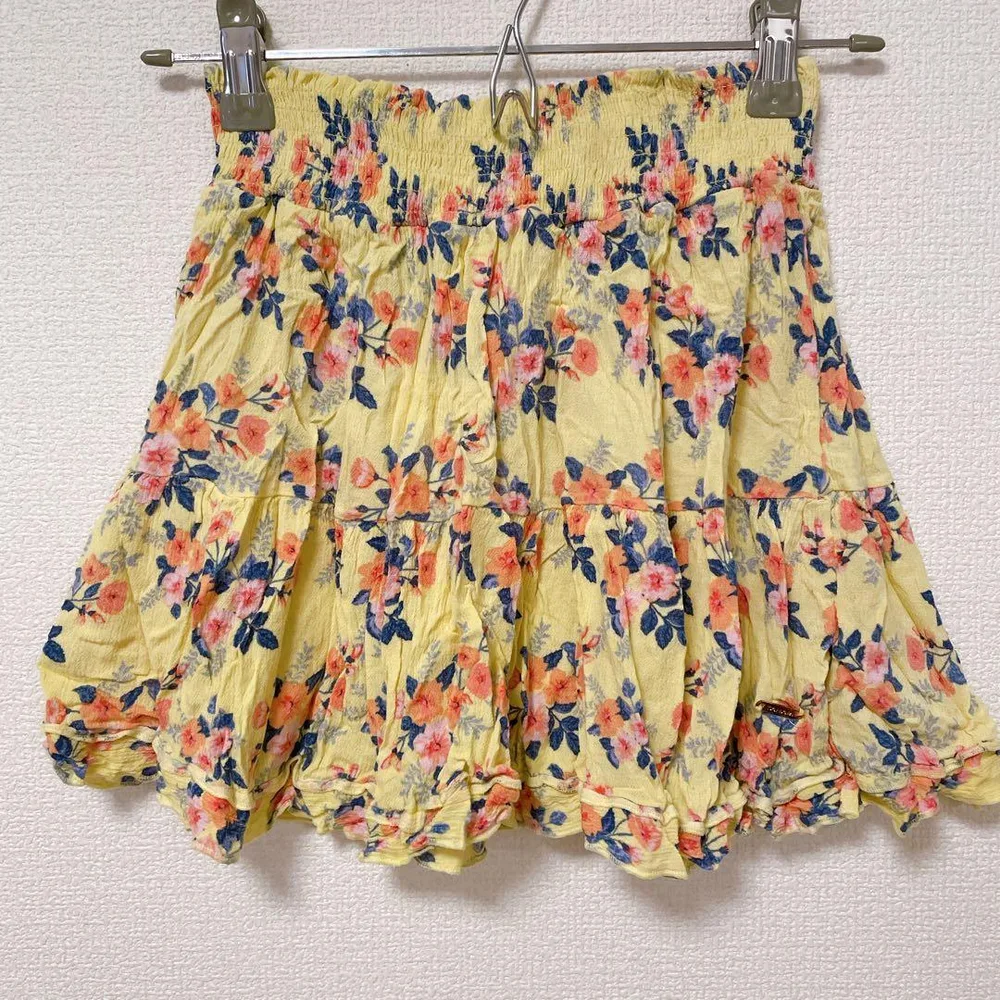 タハリガール 【120】 花柄 ミニスカート フリル 黄 レーヨン 通園 通学