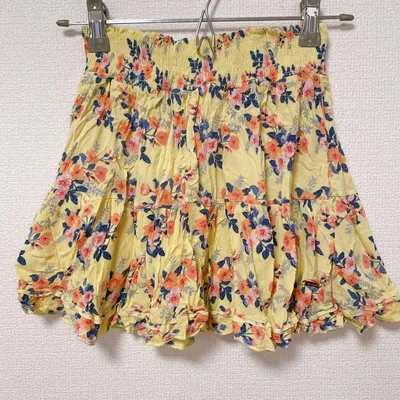 タハリガール 【120】 花柄 ミニスカート フリル 黄 レーヨン 通園 通学