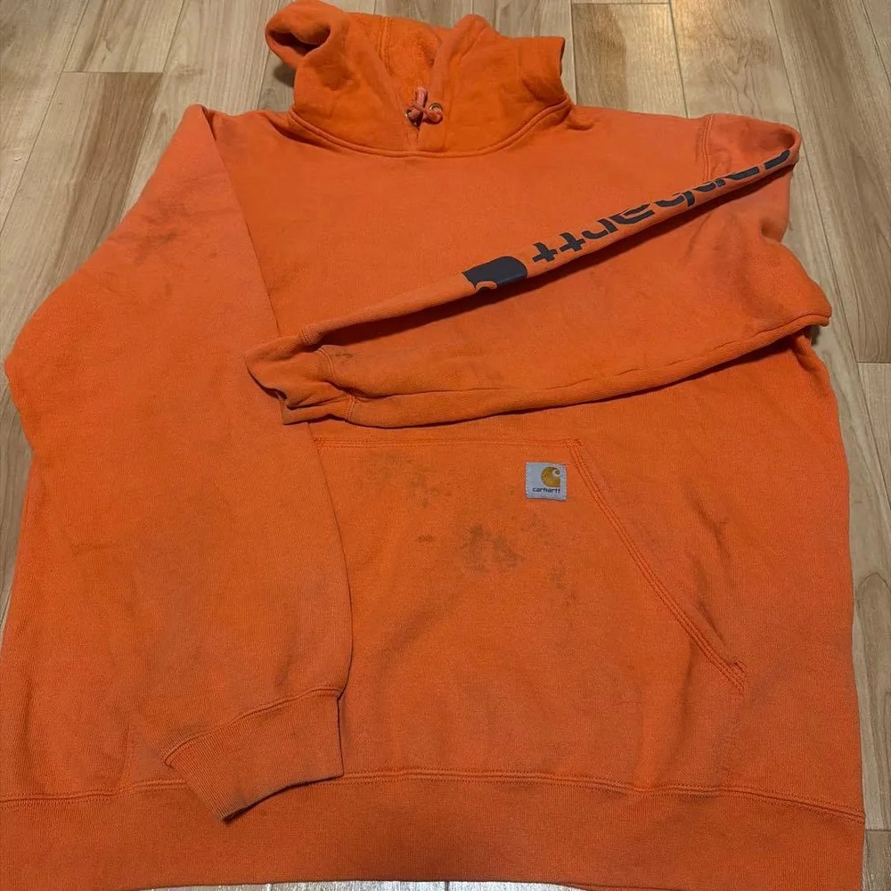 Carhartt プルオーバーパーカー オレンジ 袖ロゴ
