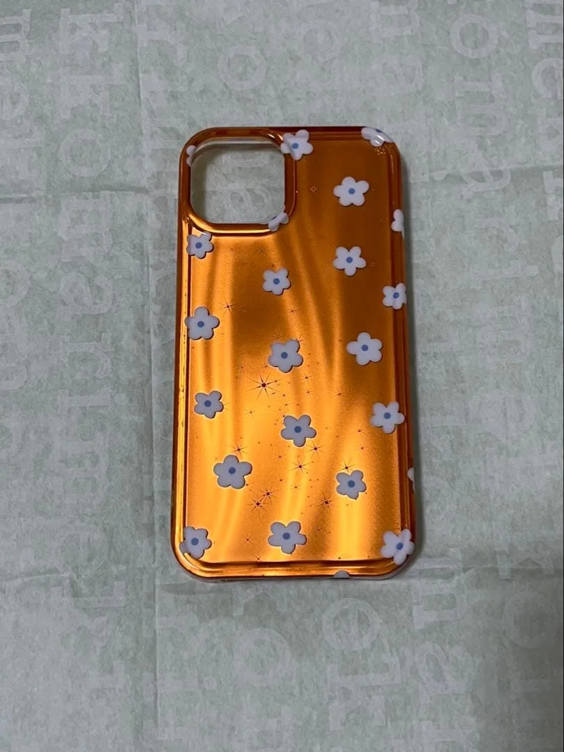 【iPhone13】オレンジ メタリック フラワー 花柄 スマホケース