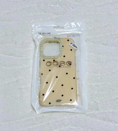 iPhone16proケース イエロー キティ 水玉ドット柄 猫耳ラインストーン