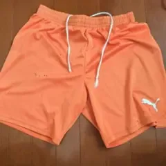 PUMA オレンジ ハーフパンツ