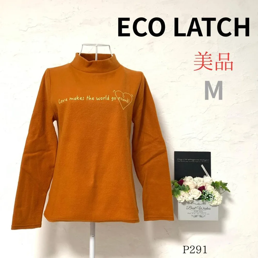 エコラッチ フリース カットソー ハイネック オレンジ プリント 美品 M