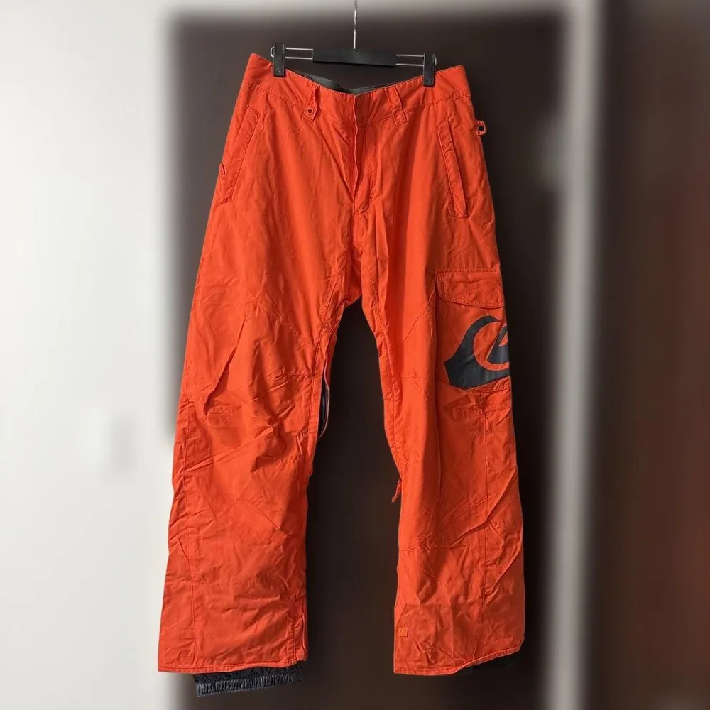 QUIKSILVER スノーボードパンツ オレンジ メンズ
