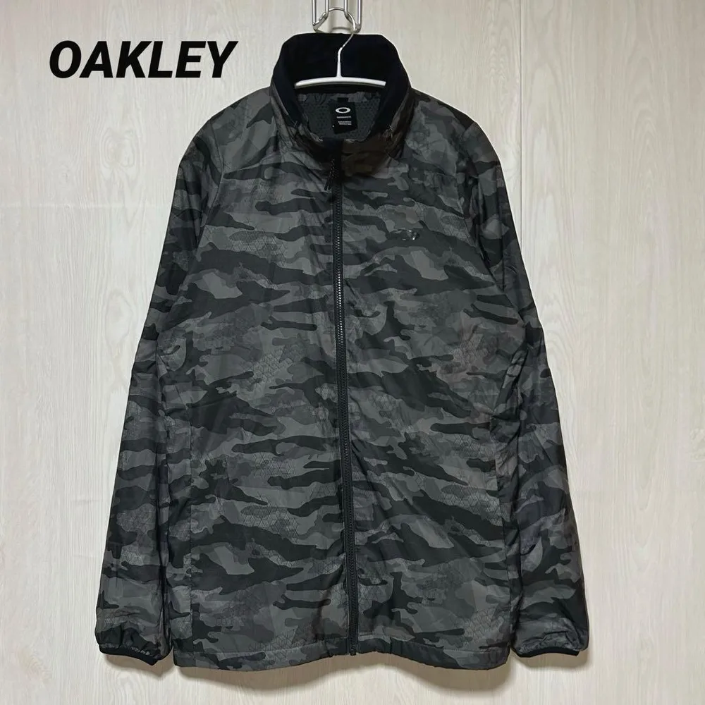 オークリー 18FW カモフラ柄 裏起毛ウインドジャケット 迷彩 JPN XL