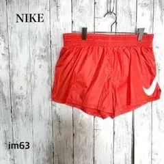 ナイキ/新品タグ付き/ショートパンツ/M/ロゴプリント/ウエストゴム/オレンジ