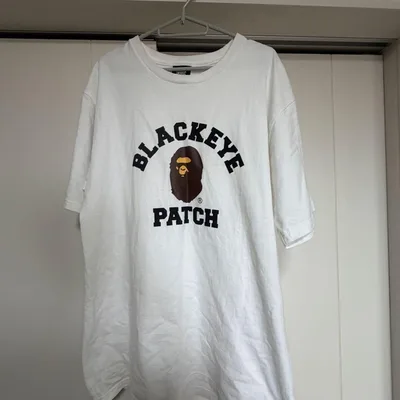 A BATHING APE × THE BLACK EYE PATCH Tシャツ
