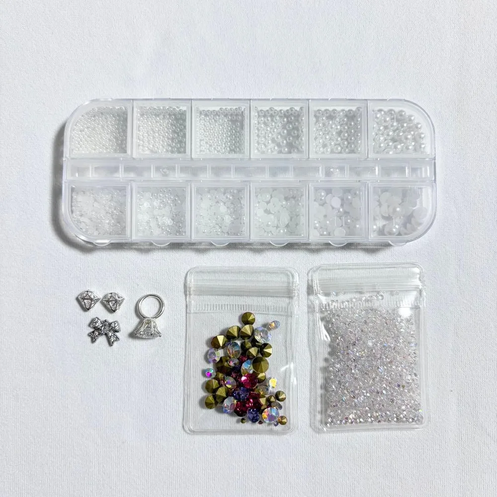 ネイルパーツ パール ストーン ピンク パープル オーロラ リボン 指輪 ダイヤ
