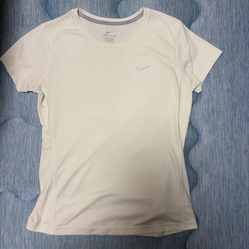 Nike DRI FIT L ホワイト ランニングトップス