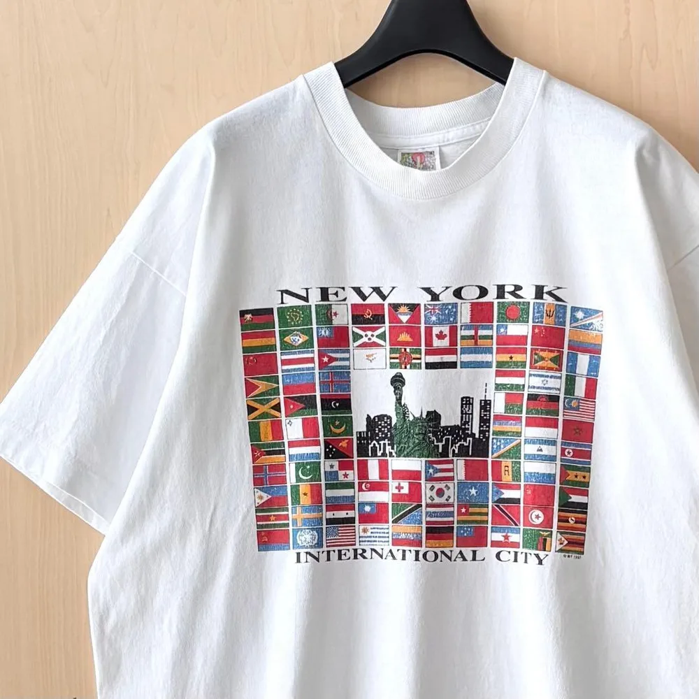 90s古着 ヴィンテージ 万国旗Tシャツ ニューヨーク 国際都市 自由の女神