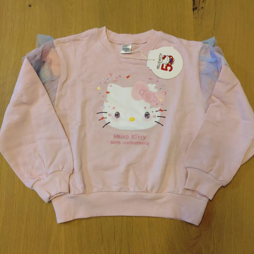 しまむら リトシー LITTC サンリオ ハローキティ 肩フリル スウェット