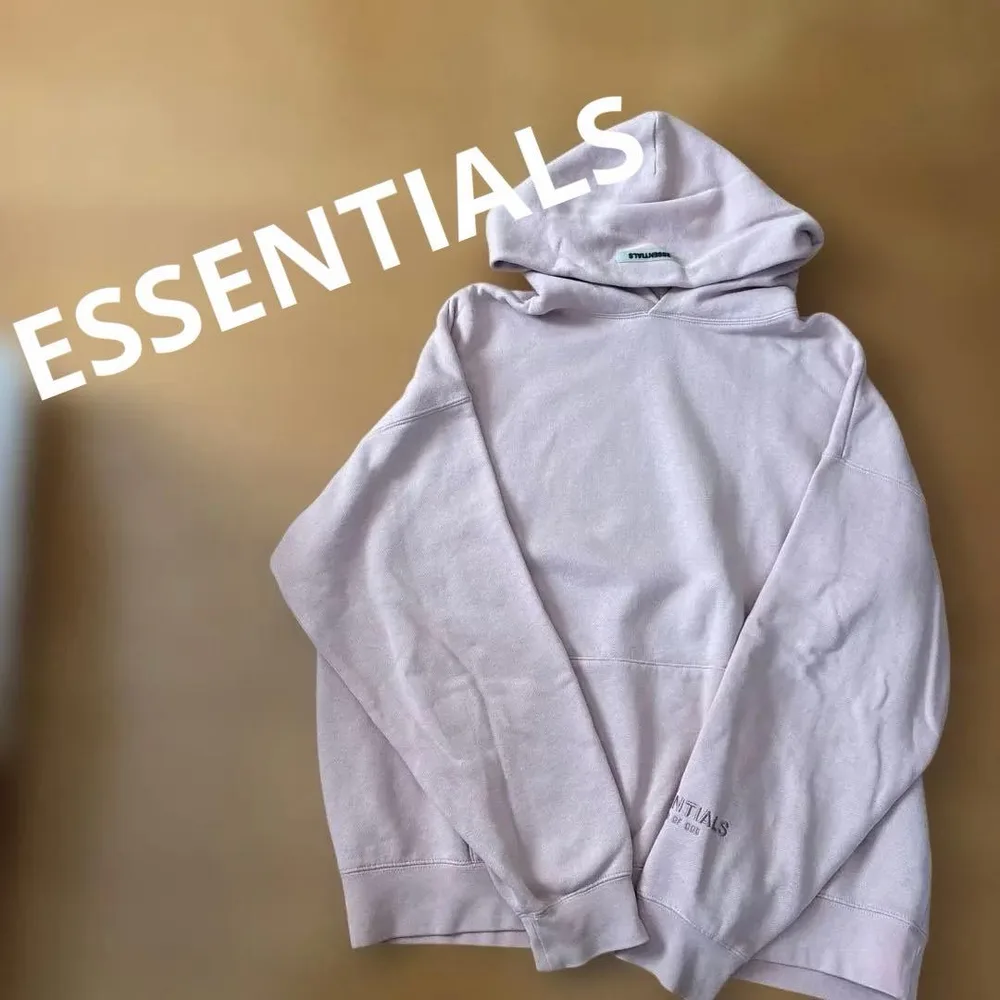 ESSENTIALS レディース パーカー ピンク スウェット