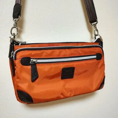 美品 ショルダーバッグ オレンジ ナイロン レザー カステロ ダ ヴィンチ