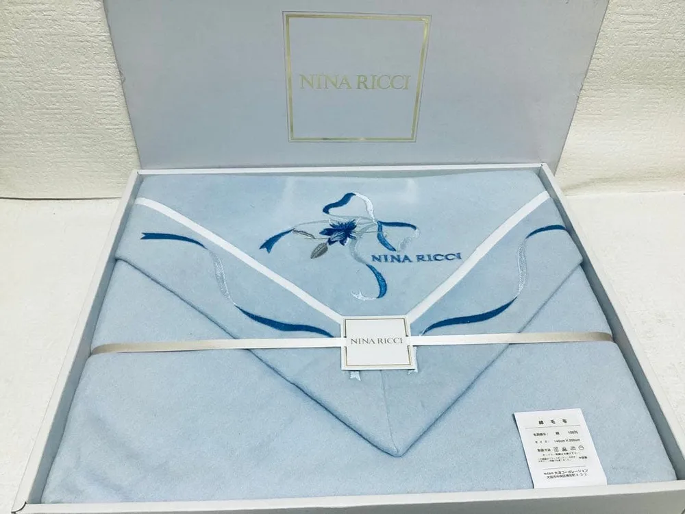 NINA RICCI(ニナリッチ)ライトブルー 綿毛布