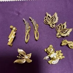 (値下げしました) 金色メタル製ピンバッチ8個セット
