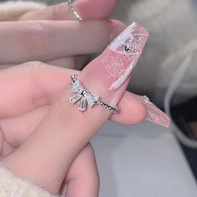 【新品】リボンモチーフ リング シルバーカラー 指輪