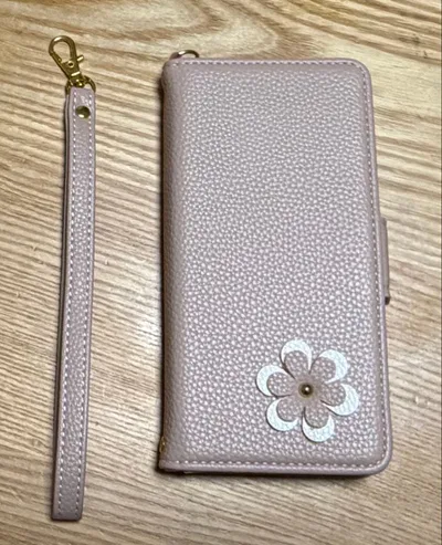 iPhone13携帯 ピンクの花モチーフ手帳型ケース