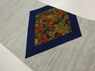 手織り紬切り嵌め相良刺繍草花に菱模様開き名古屋帯(額縁仕立て)【中古】【着】【名古屋帯】