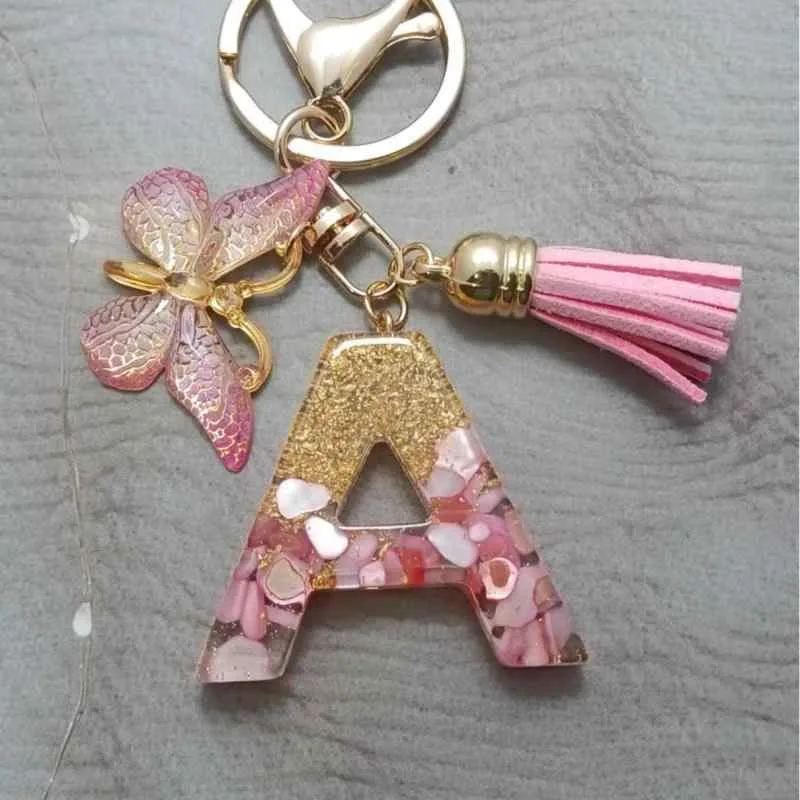 キーホルダー レディース キーリング アルファベット 金箔 シェル ストーン フリンジ バタフライ チャーム バッグチャーム アクセサリー かわいい プレゼント ギフト