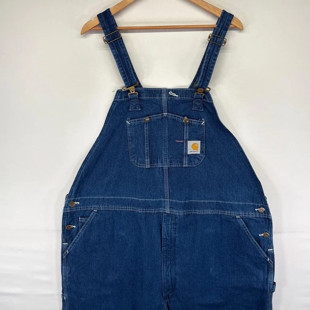 古着 カーハート Carhartt デニム オーバーオール ワンポイントロゴ ジップ ワーク ハンマーループ 作業着 W50 L32 ブルー系 メンズ 【中古】