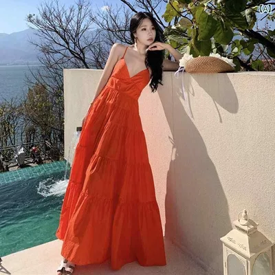 レディース リゾート ワンピース 旅行 写真 フェアリー ドレス オレンジ ディープ V ネック 背中 開いた サスペンダー 海辺 ビーチ 女性