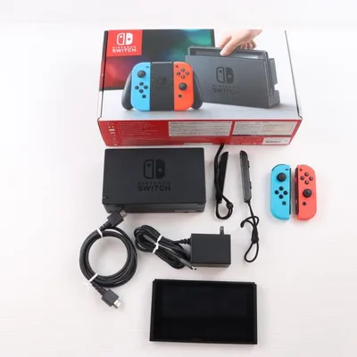 เครื่องเกม Nintendo Switch มือสอง Joy-Con สีน้ำเงินนีออน/แดงนีออน (HAC-S-KABAA)