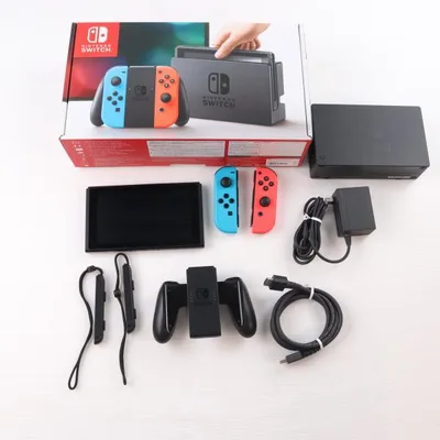 เครื่องเกม Nintendo Switch มือสอง Joy-Con สีน้ำเงินนีออน/แดงนีออน (HAC-S-KABAA)