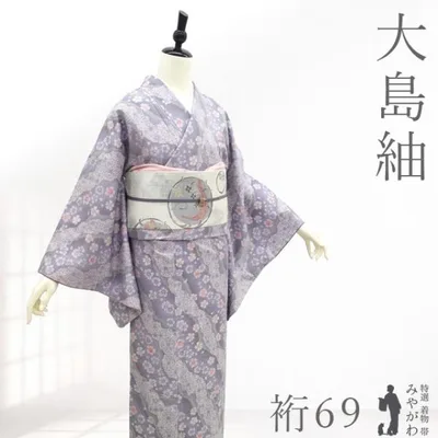 大島紬 着物 本場大島紬 未使用 正絹 袷 色大島 織絣 特横双 薄灰紫色 桜 新古品 仕立て上がり 身丈167 裄丈69 Lサイズ みやがわ sb18266